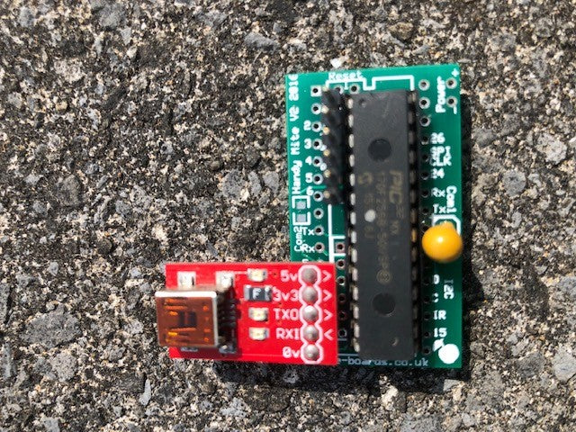 Red USB to Serial Bridge not included